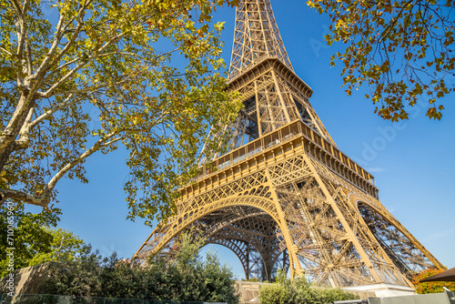 Front of the Eiffel Tower on a sunny summer day with blue sky in Paris, France © JeanLuc Ichard