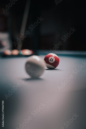 Billiard balls and cue