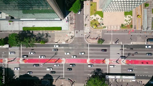 Top Down View of Intersection of famous avenues in Brazil. Paulista and Consolacao Avenues. Transportation Scene. Aerial View of Traffic and Pedestrian on Crosswalk. Aerial Landscape of São
 photo