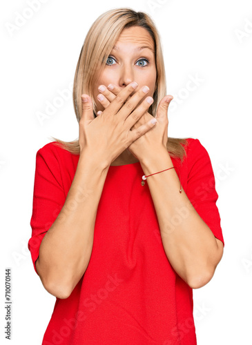 Middle age caucasian woman wearing casual clothes shocked covering mouth with hands for mistake. secret concept.