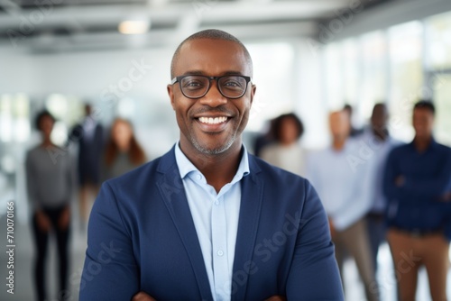 Portrait of a mature businessman posing in modern office