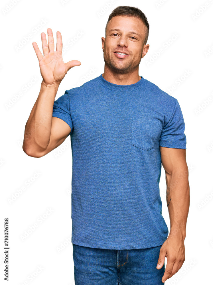 Handsome muscle man wearing casual clothes showing and pointing up with fingers number five while smiling confident and happy. Handsome muscle man wearing casual clothes showing and pointing up with fingers number five while smiling confident and happy.