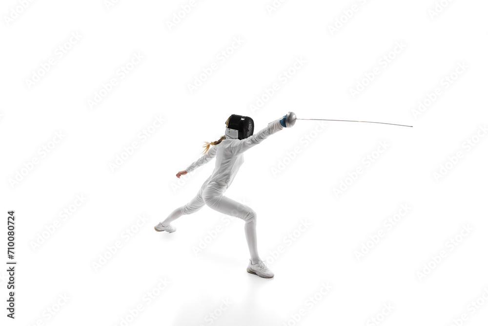 Martial arts and discipline. Fencing, a martial art requiring discipline and strategy, perfect for related themes. Female athlete training over white background. Concept of sport, competition