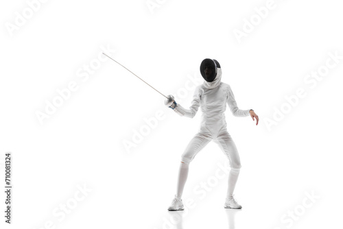 Fencing apparel. Displaying the specialized gear and clothing designed for safety and agility in fencing. Female fencer training on white background. Concept of sport, competition, championship, hobby