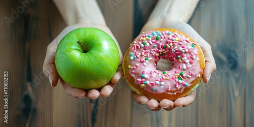 Choosing between healthy food and unhealthy food, apple or donut, what will be your choice, healthy food, fast food photo