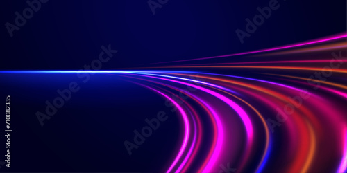 Glowing spark swirl trail tracing on dark blue background. Abstract light lines of movement and speed. Light line moving with speed.	