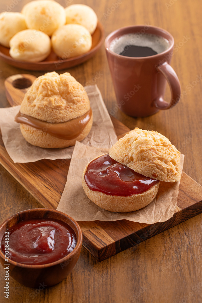 Brazilian snack. Pão de Queijo filled with guava cream (Goiabada). Breakfast. Black coffee. Brazilian snack. Pão de Queijo filled with guava cream (Goiabada). Breakfast. Black coffee.
