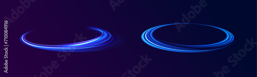 Wavy transparent curved lines in the form of the movement of sound waves in a set of different shapes of whirlpool, twist, spiral. Light arc in blue colors, in the form of a turn and a zigzag.	 photo