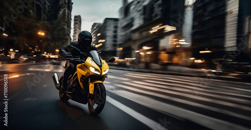 fast motorcycle race through the night city, a sports motorcycle and a motorcyclist in a uniform and helmet