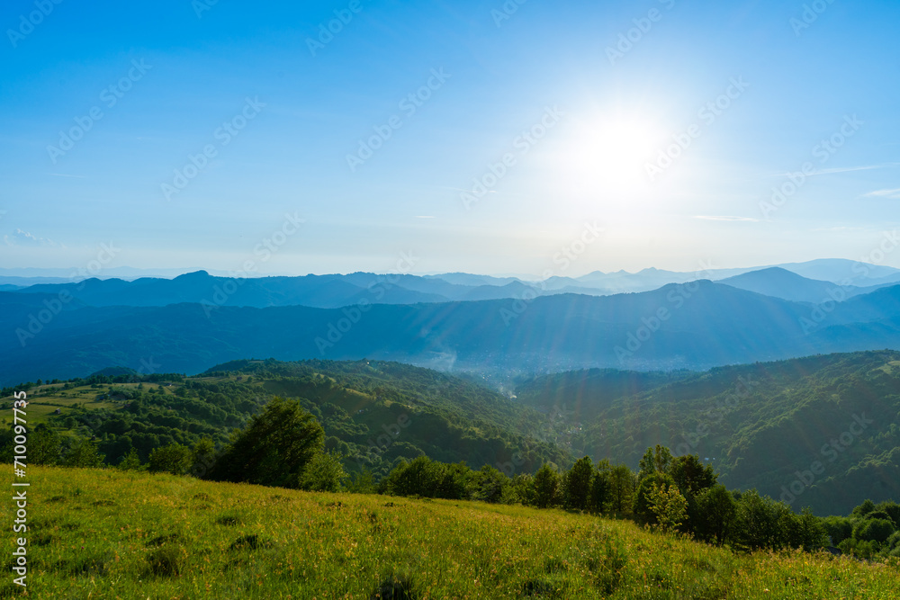 Carpathians mountains landscapes from green meadow on sunset, Apetska mountain, Ukraine