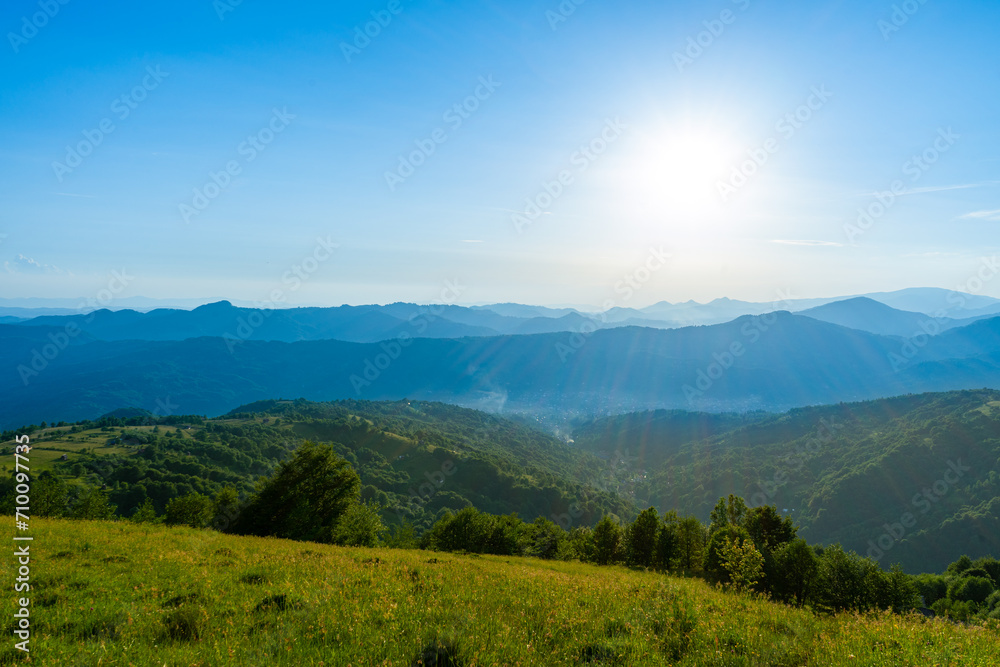 Fototapeta premium Carpathians mountains landscapes from green meadow on sunset, Apetska mountain, Ukraine