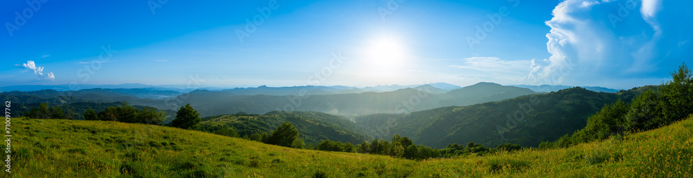 Obraz premium Carpathians mountains landscapes from green meadow on sunset, Apetska mountain, Ukraine