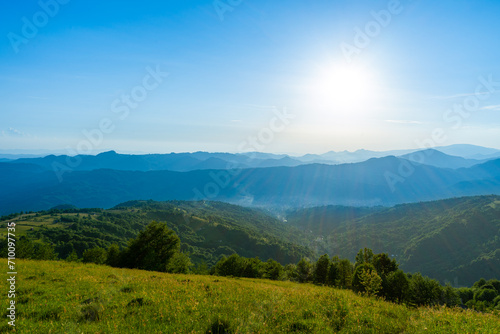 Carpathians mountains landscapes from green meadow on sunset, Apetska mountain, Ukraine
