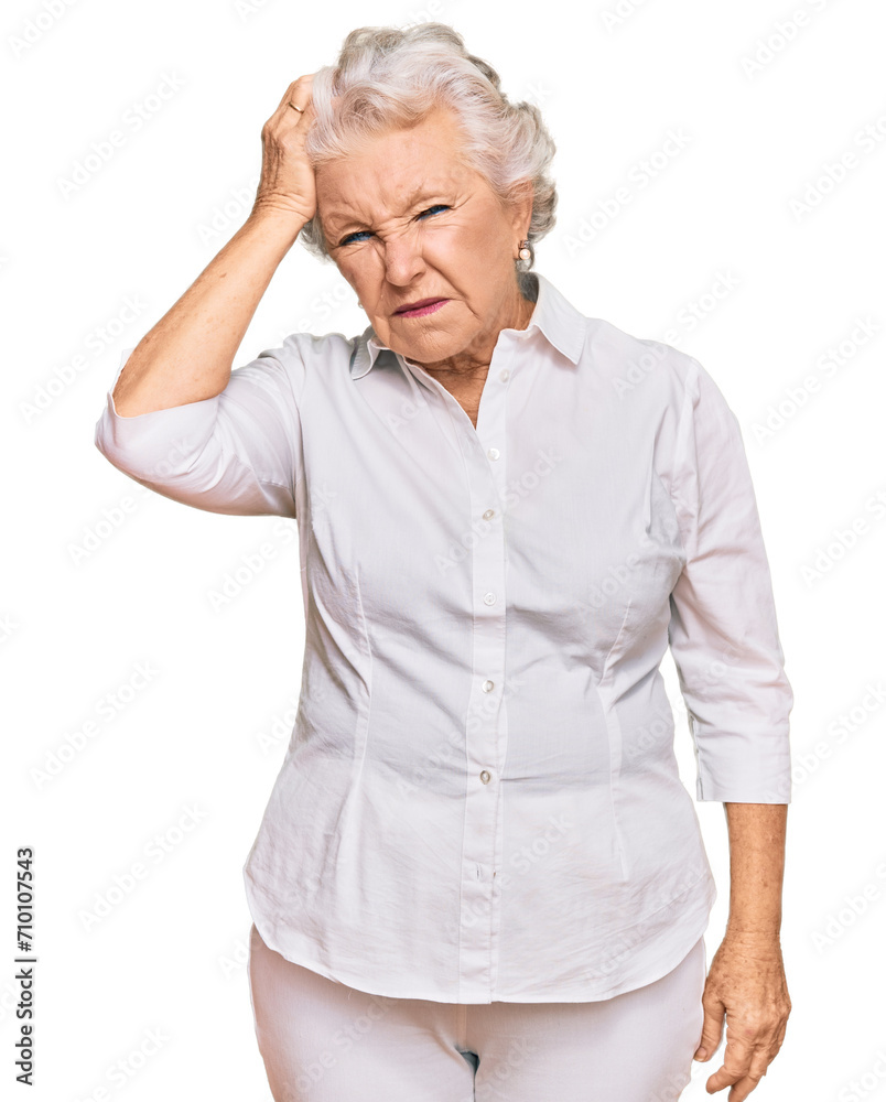 Senior grey-haired woman wearing casual clothes confuse and wonder about question. uncertain with doubt, thinking with hand on head. pensive concept. Senior grey-haired woman wearing casual clothes confuse and wonder about question. uncertain with doubt, thinking with hand on head. pensive concept.