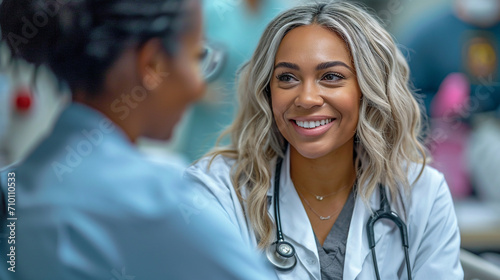 Portrait of smiling nurse talking to patient