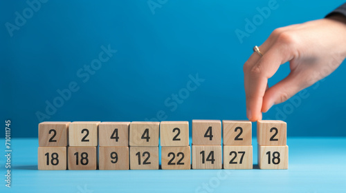 hand holding a block