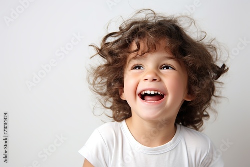 Portrait of cute child on white background