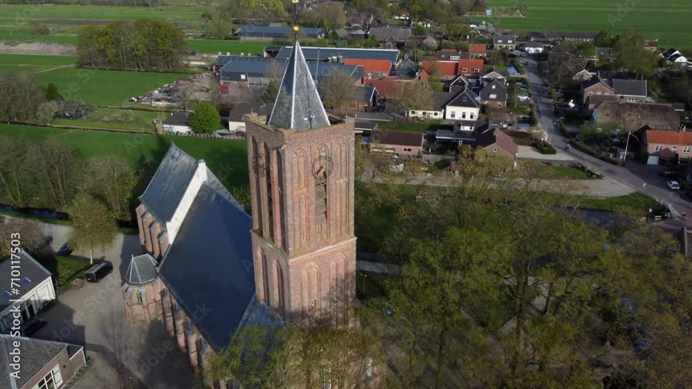 Aerial view of Westbroek Church located in the center of The Netherlands near Utrecht it is a village known for its beautiful farms and meadows less busy than the urban area at the larger city 4k Aerial view of Westbroek Church located in the center of The Netherlands near Utrecht it is a village known for its beautiful farms and meadows less busy than the urban area at the larger city 4k