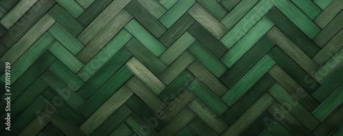 Green oak wooden floor background. Herringbone pattern parquet backdrop photo