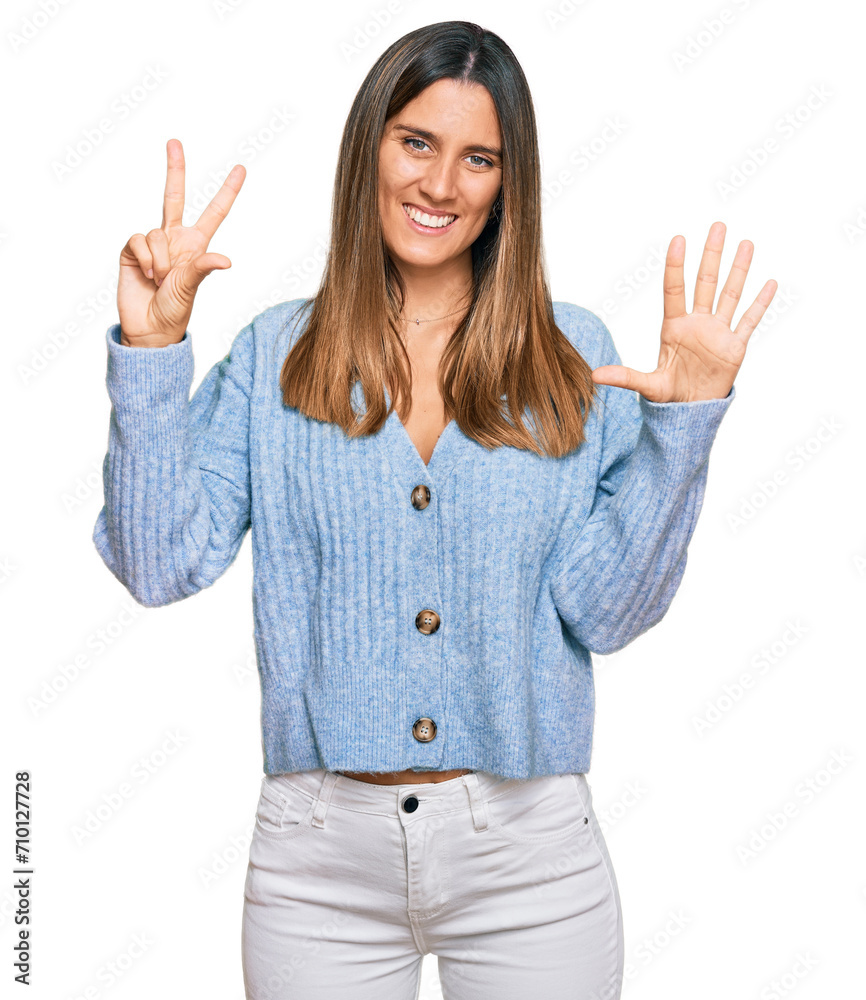 Young woman wearing casual clothes showing and pointing up with fingers number eight while smiling confident and happy. Young woman wearing casual clothes showing and pointing up with fingers number eight while smiling confident and happy.