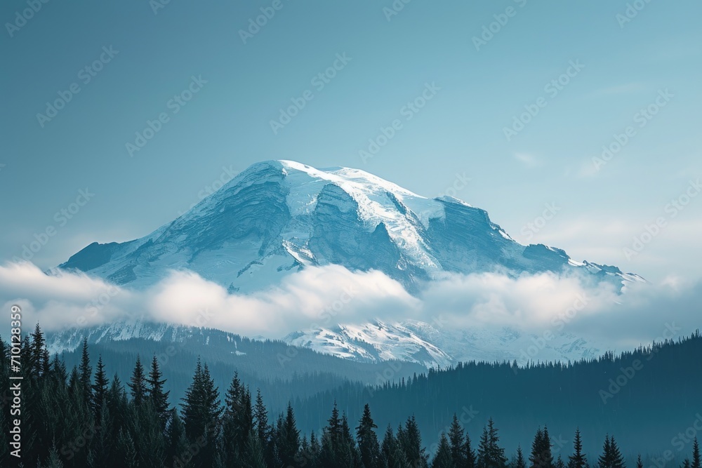 A picturesque view of a snow-covered mountain with beautiful trees in the foreground. Perfect for winter landscapes and nature-themed projects