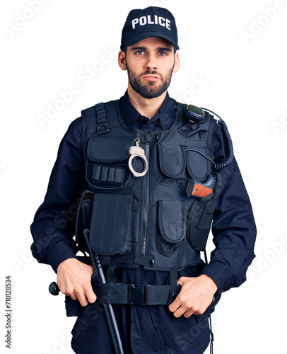 Young handsome man with beard wearing police uniform skeptic and nervous, frowning upset because of problem. negative person.