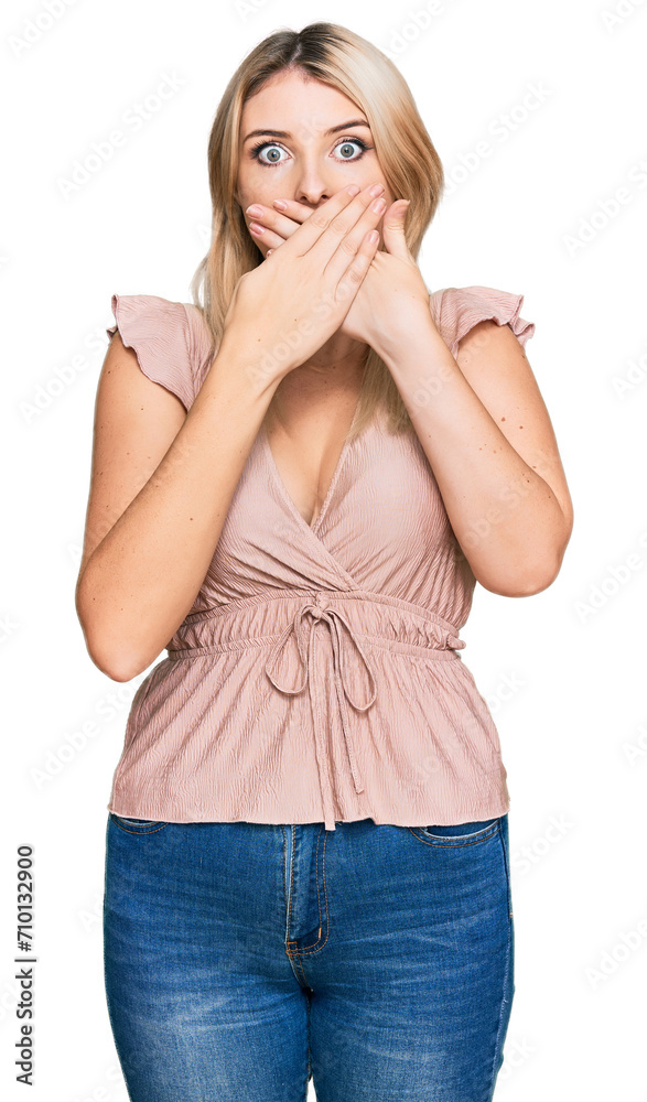 Young caucasian woman wearing casual clothes shocked covering mouth with hands for mistake. secret concept. Young caucasian woman wearing casual clothes shocked covering mouth with hands for mistake. secret concept.