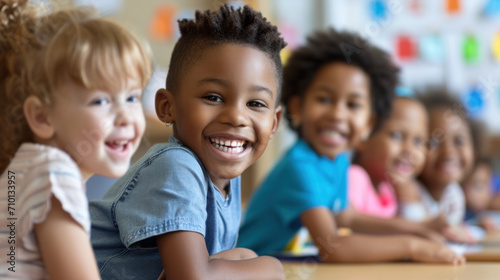 Joyful children sharing a laugh in a vibrant classroom  a snapshot of innocent camaraderie