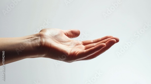 Close-up of a hand with extended fingers, catching the light, isolated white background generative ai photo