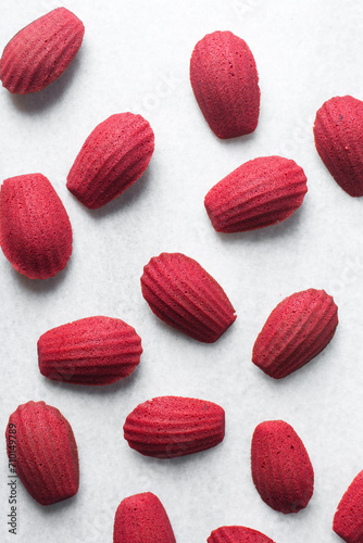Red velvet madeleines on a marble tray, red madeleines cake or cookies for valentines photo