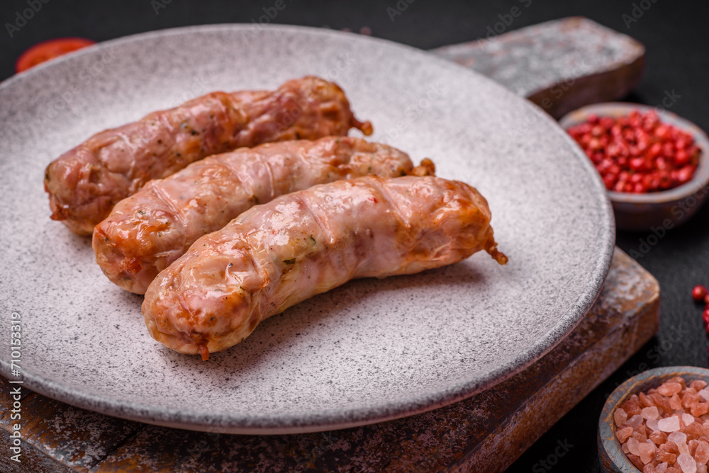 Delicious juicy grilled chicken or pork sausages with salt, spices and herbs Delicious juicy grilled chicken or pork sausages with salt, spices and herbs