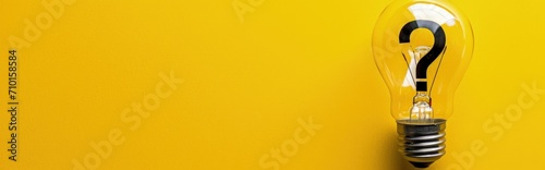 Light bulb and question mark sign on yellow background, concept of creativity, ideas and curiosity.	 photo