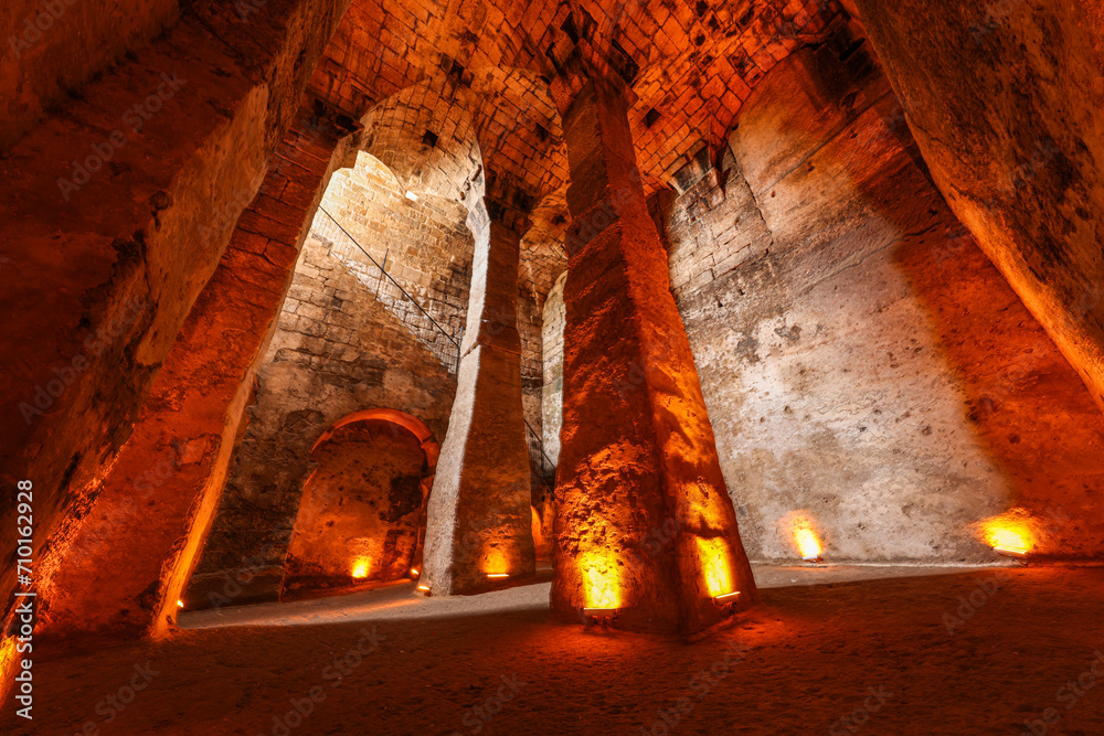 Dara Ancient City. Mesopotamia. Mardin, Turkey.Dara Ancient City, one of the most important settlements of Mesopotamia. The ancient water cistern, was later used as a dungeon. - obrazy, fototapety, plakaty 