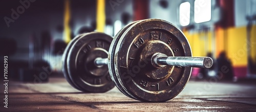 barbells are located on the floor, gym, fitness room