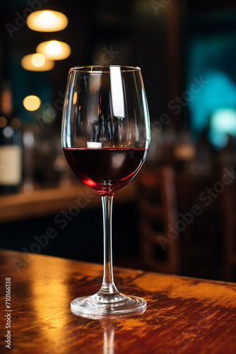 Luxury wineglass on wooden table in elegant bar generated by AI