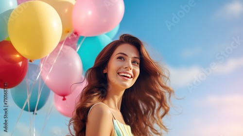 Portrait happy woman holding multicolored air balloons against the blue sky background. AI generated