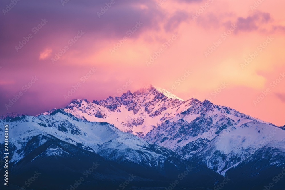 Majestic Snow-Capped Mountain Peaks at Sunset