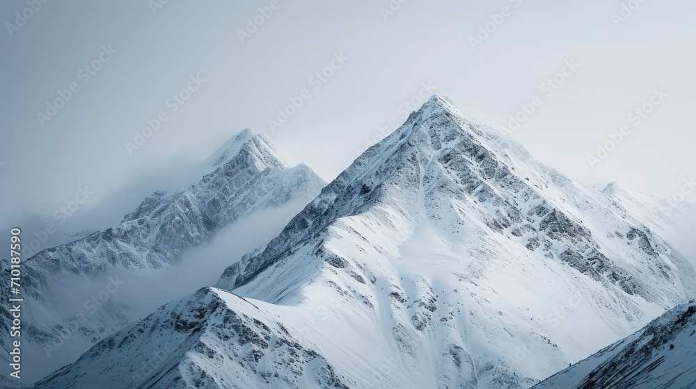 (Mountain majesty) Grand mountain peaks covered in snow, awe-inspiring and majestic
