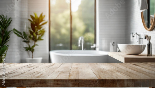 Serene white bathroom interior with minimalist design, showcasing an empty wooden tabletop for product display, featuring blurred bathroom elements. Clean, modern, and inviting