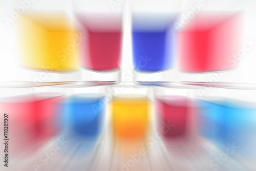 Multicolored blurry background from water color glass