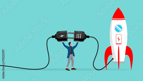 prepare start up business to achieve goal or target, Start up target of business development process, businessman connect plug with rocket to power socket to charge rocket for launching new product