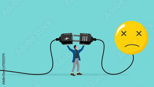 overworked or stressed at work, refresh or recover after tired at work, re charge yourself, restore enthusiasm for work, recharge mood, businessman connect plug with bad mood icon to power socket photo