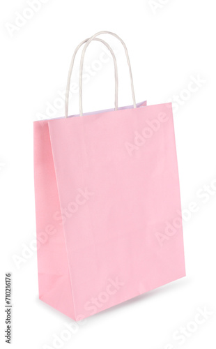 One light pink paper shopping bag isolated on white