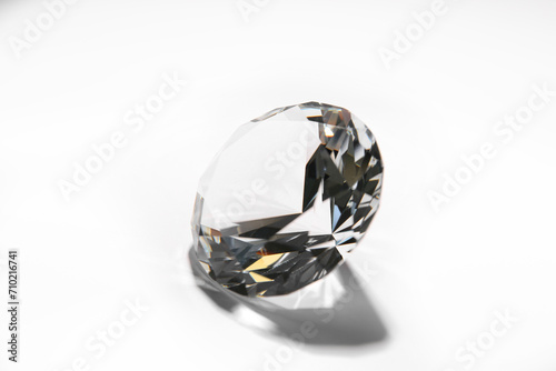 One beautiful shiny diamond on white background