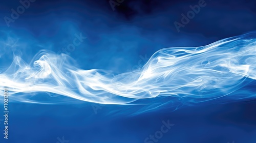 Ethereal blue smoke swirling gently against a dark background