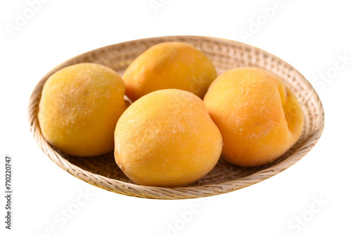 Yellow peaches fruit in basket