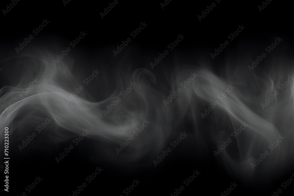 Hypnotic smoke patterns on dark abstract background in enigmatic atmosphere. Sinuous contours of smoke in nuances of shadows and reflections in a deep composition. Hypnotic smoke patterns on dark abstract background in enigmatic atmosphere. Sinuous contours of smoke in nuances of shadows and reflections in a deep composition.