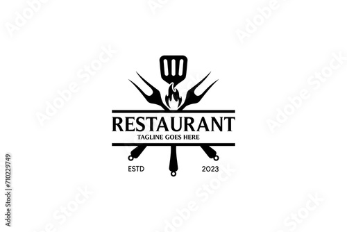 Restaurant logo design template with grill tool spatula symbol, cooking logo