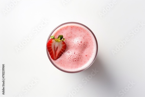 Wallpaper Mural Top view of a glass containing a refreshing strawberry milkshake or smoothie, standing alone against a white background. Torontodigital.ca