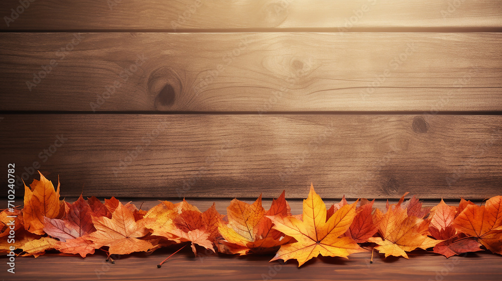 orange autumn leaves on wooden background orange autumn leaves on wooden background